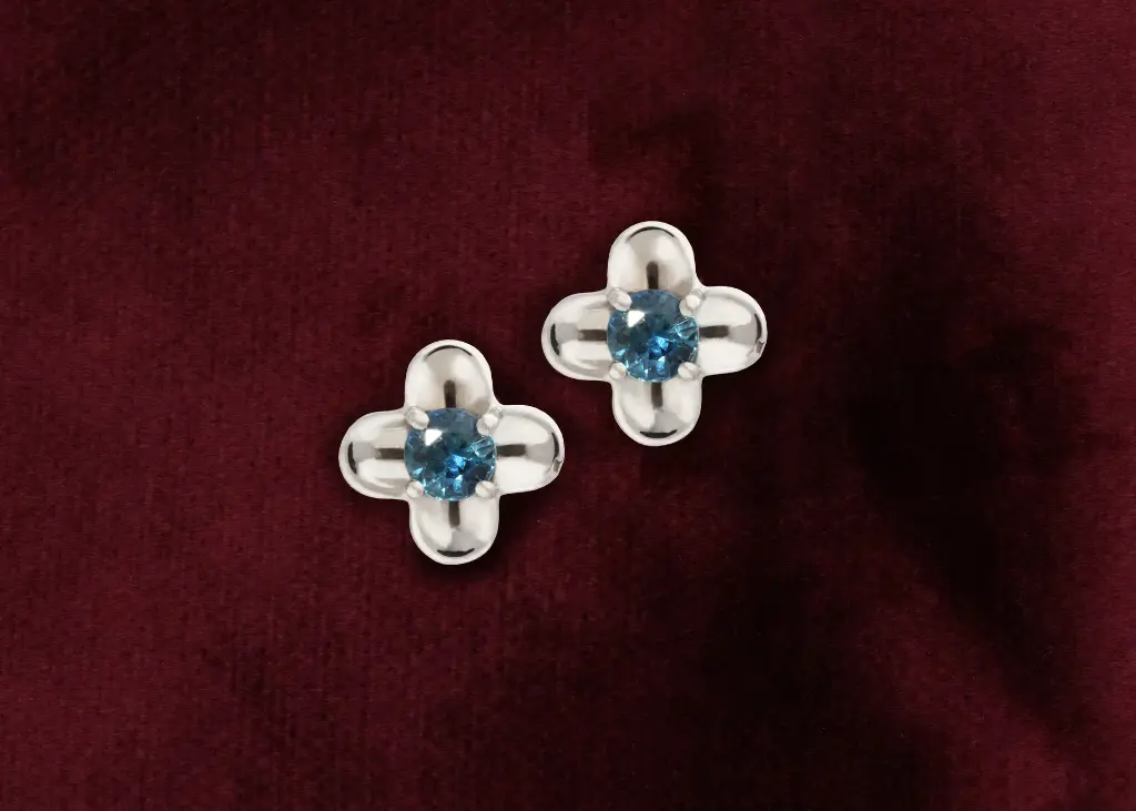 Sapphire flower studs WG.webp